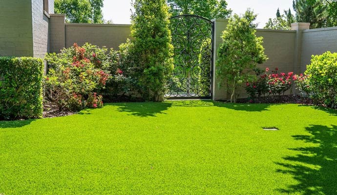 An elegant garden courtyard with synthetic grass turf