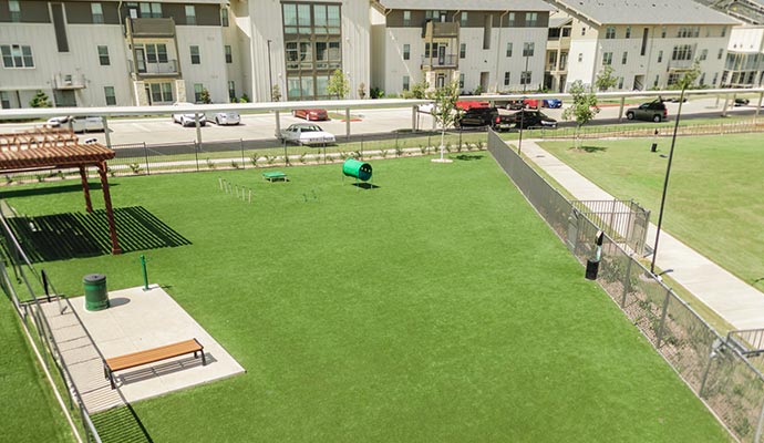 Apartment complex park artificial turf installation