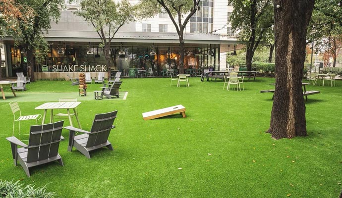 Artificial grass with seating arrangement
