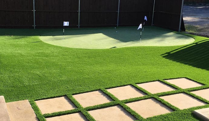 Artificial turf backyard putting green