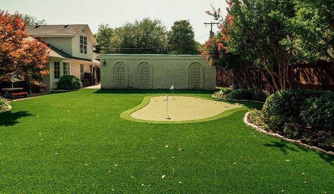 Artificial turf installed on a backyard putting green