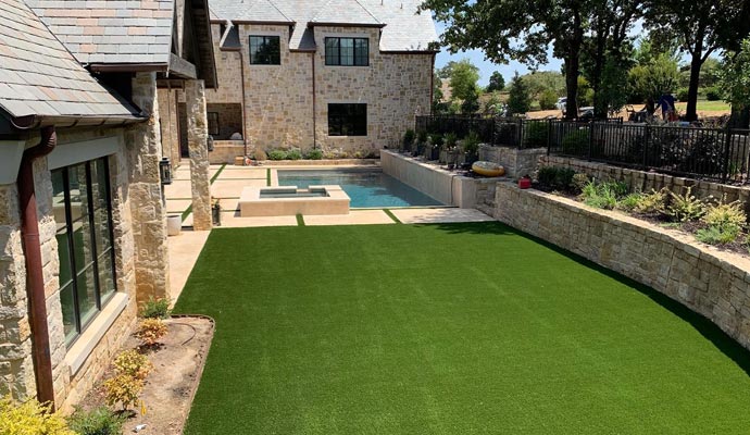 Backyard turf near pool