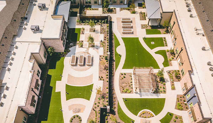 Aerial view of commercial property courtyard with synthetic turf