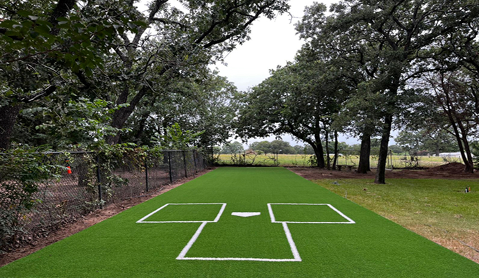 Synthetic turf installed in a batting cage