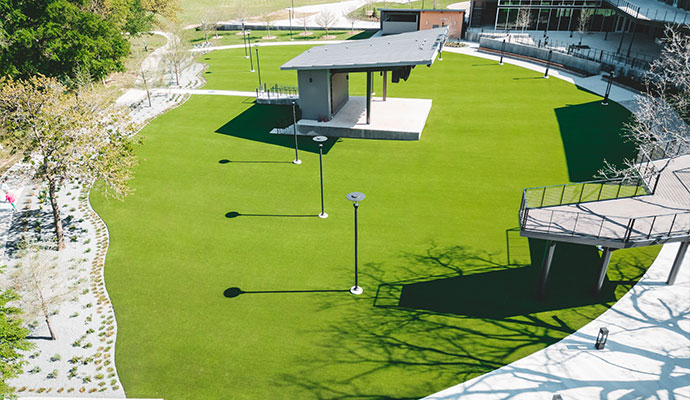 Commercial outdoor amenity lawn with synthetic turf