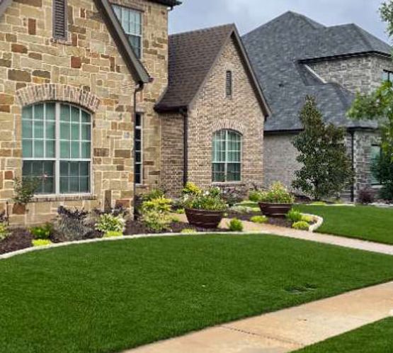 Installed synthetic grass turfs in front of a house