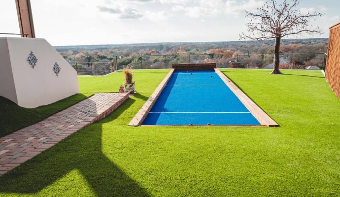 Rooftop bocce court with artificial grass