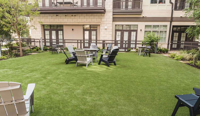 Synthetic turf installed in an apartment community outdoor seating area