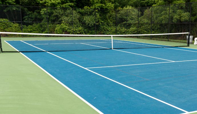 Installed tennis court turf in backyard