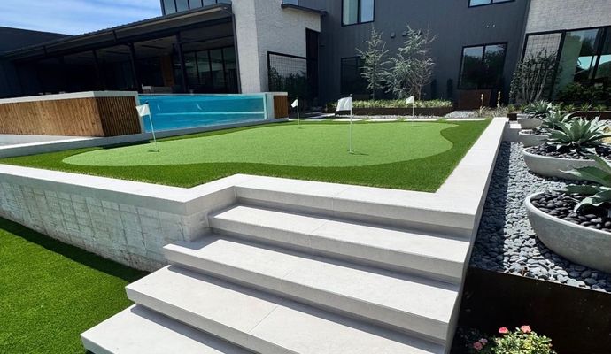 custom putting green luxury outdoor space in a modern home
