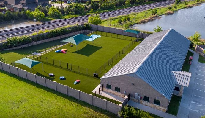 Dog daycare with installed pet friendly large turf
