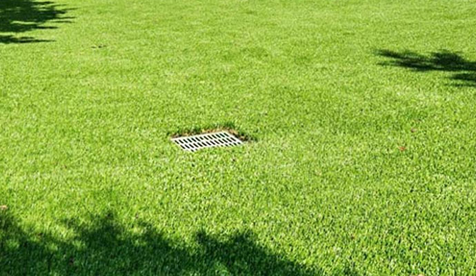 Drainage solutions for artificial turf
