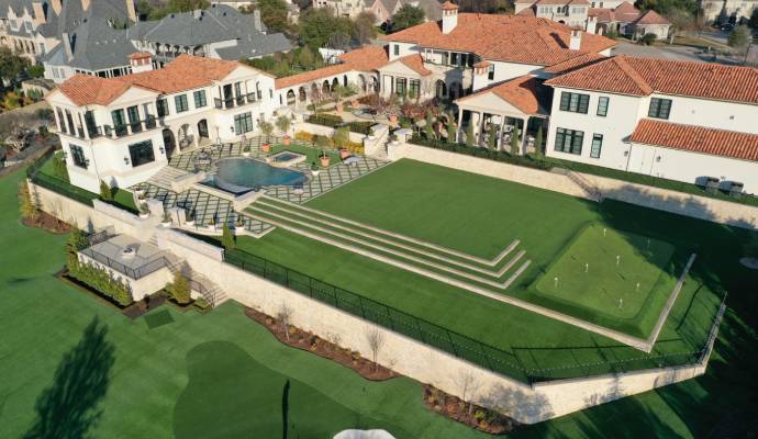 Installed artificial grass in residential backyard