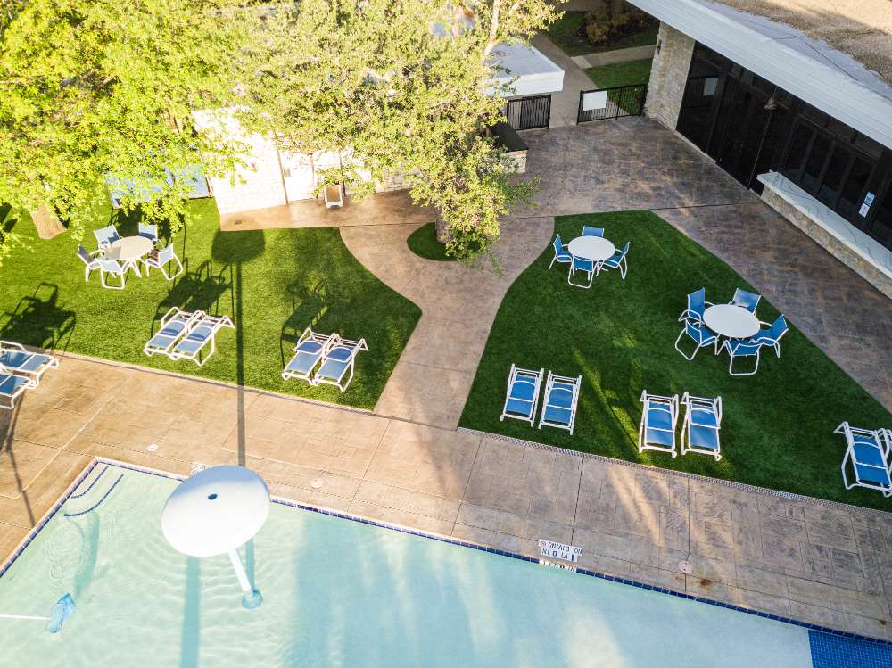 Bird’s-Eye View of Poolside Amenity Lawn at Ridglea Country Club in Fort Worth