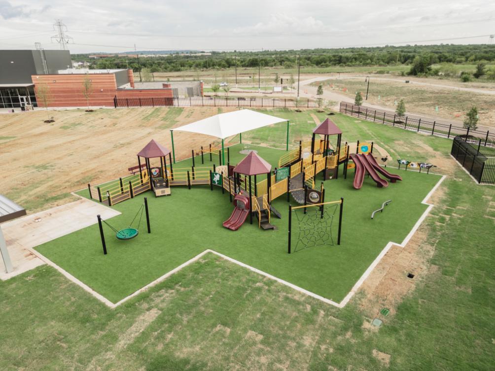 Artificial grass school playground surface