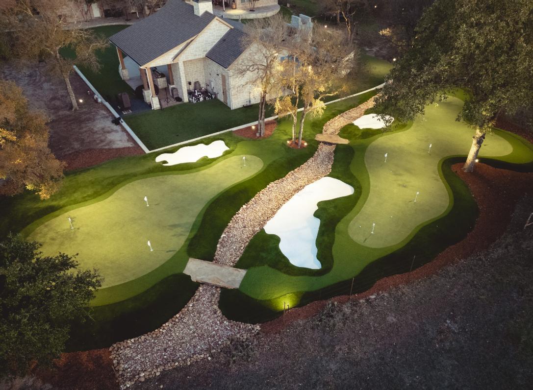 Backyard putting green with artificial grass