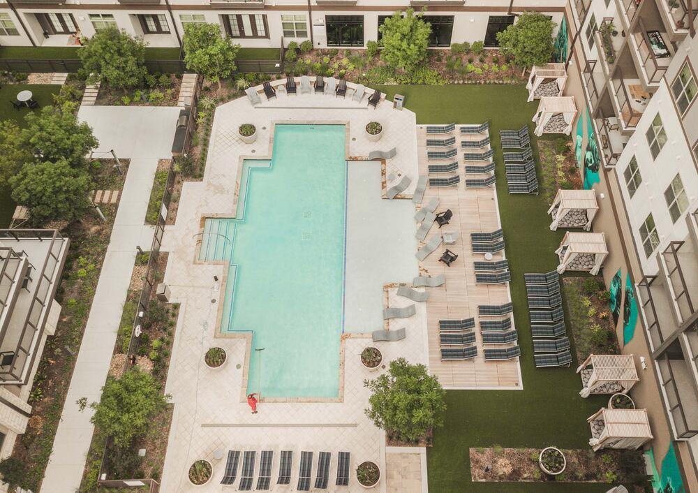 Courtyard with artificial grass lawn