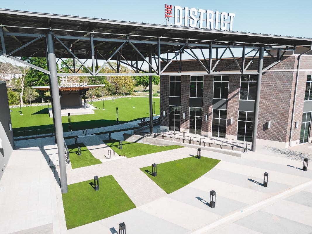 District plaza designed with artificial grass