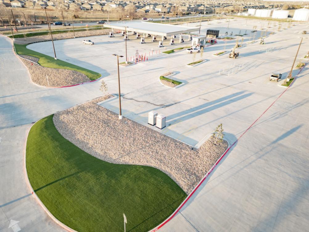 Fuel station with artificial grass