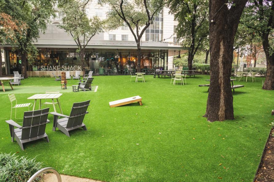 Outdoor seating on artificial grass lawn