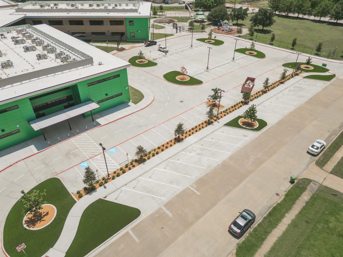 Parking area with artificial grass landscaping