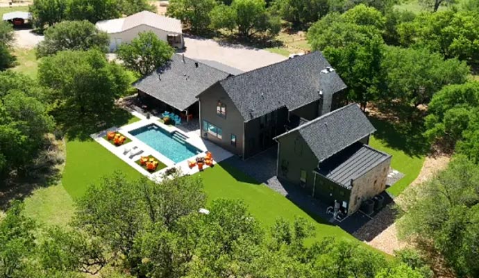 Modern house surrounded by artificial turf