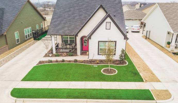 Residential front yard with artificial turf