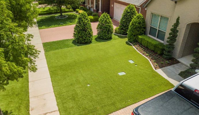 Beautiful front yard with synthetic grass